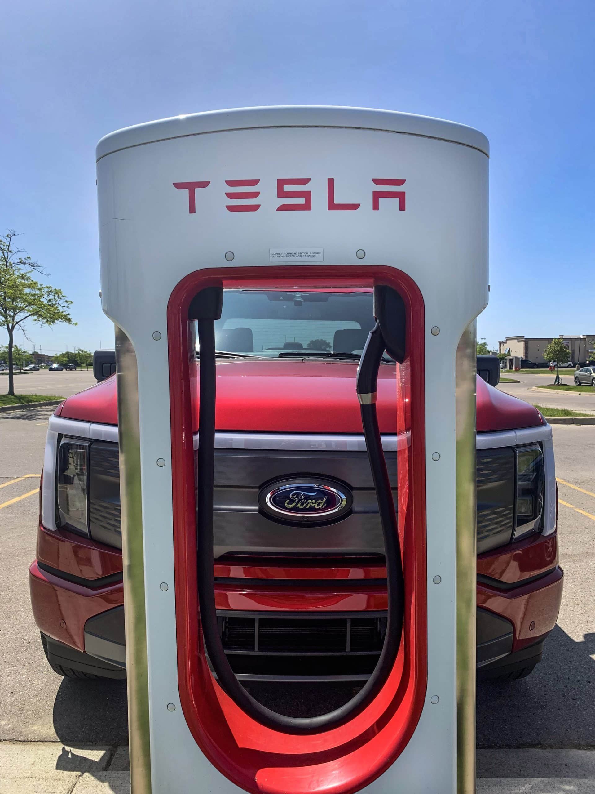 ford ev tesla superchargers stock EVU