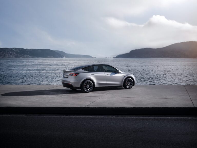 tesla model y water backdrop evu